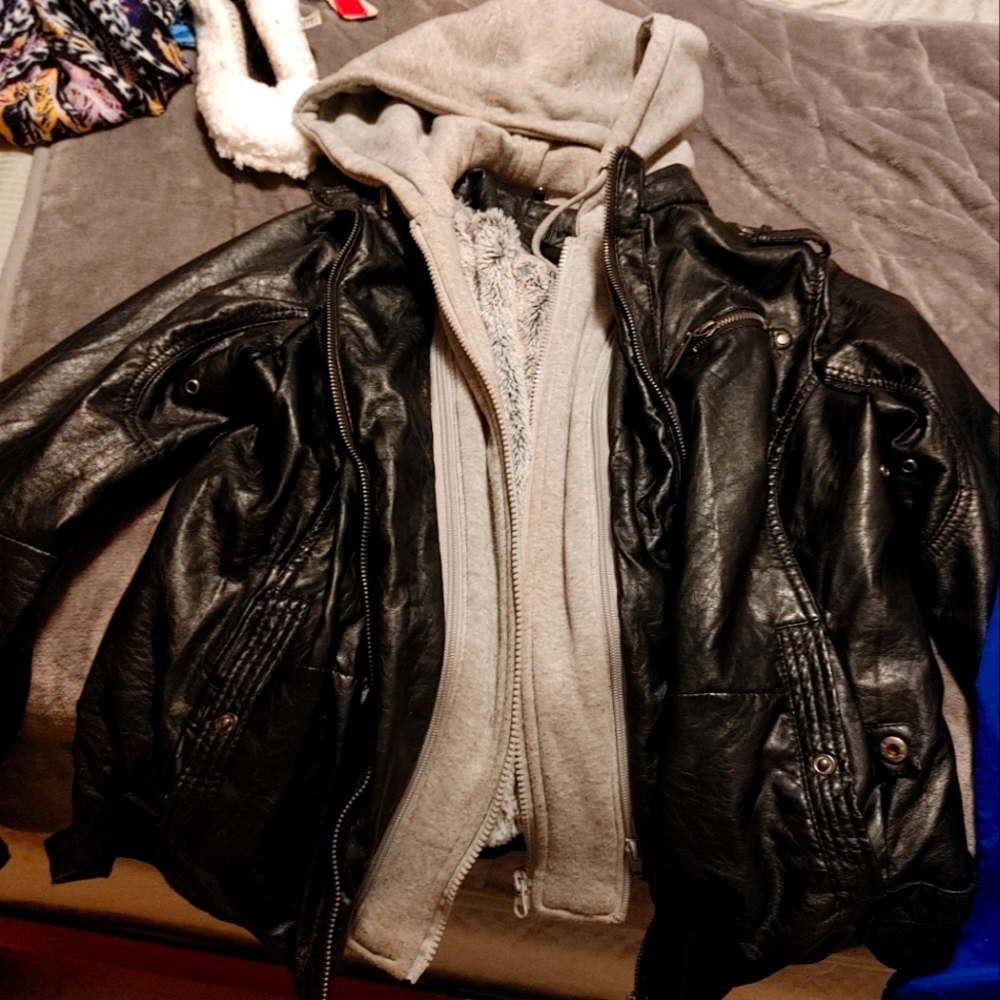 Leather jacket with fur inside, like large fits a
